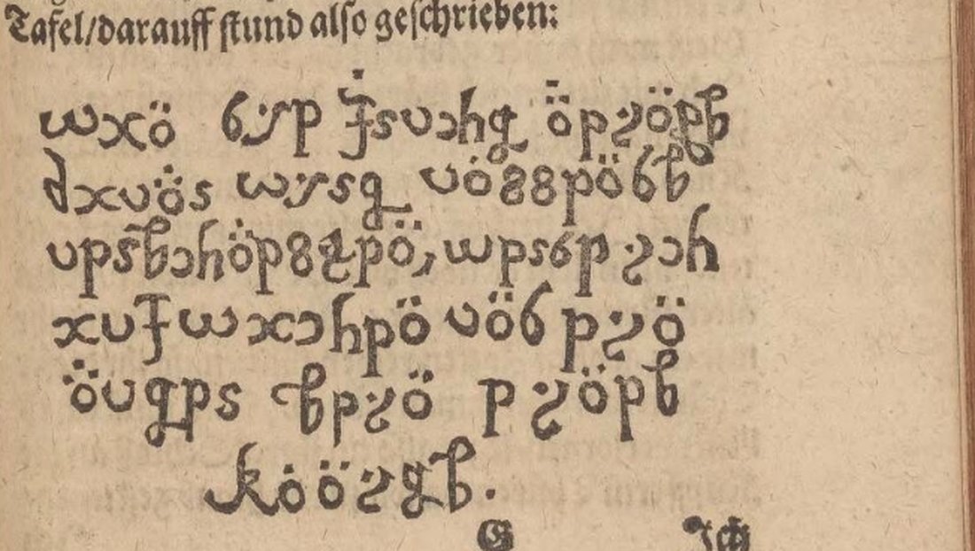 A printed page with a line of invented letters