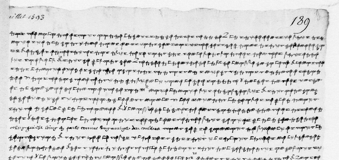 The upper half of f. 189: lines of small drawn signs, rings, stems, 4-shapes and brackets, with one line in clear handwriting