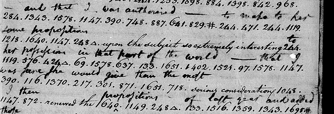 Lines of dotted code numbers with Jacob Wagner's decode written above them in a smaller hand