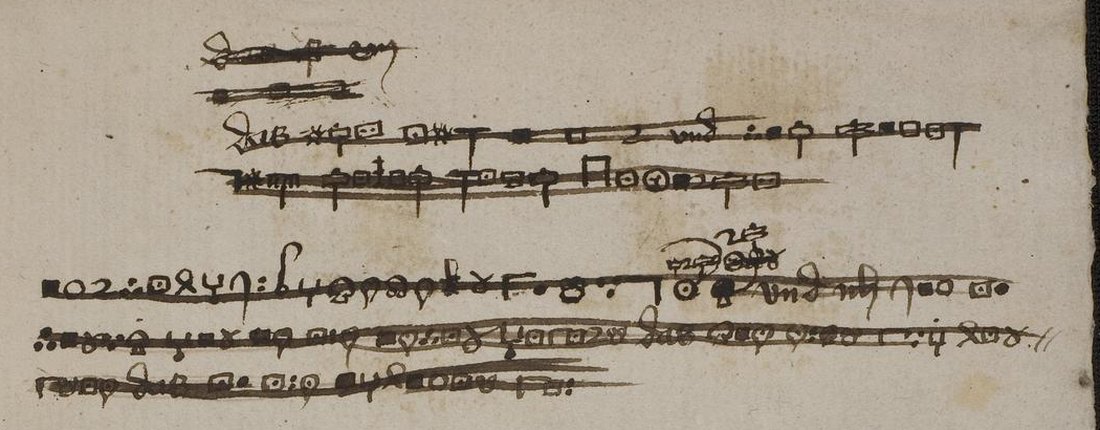 Four struck lines of geometric signs; the third line is an unbroken run of about twenty-four signs followed by the clear words vnd ich