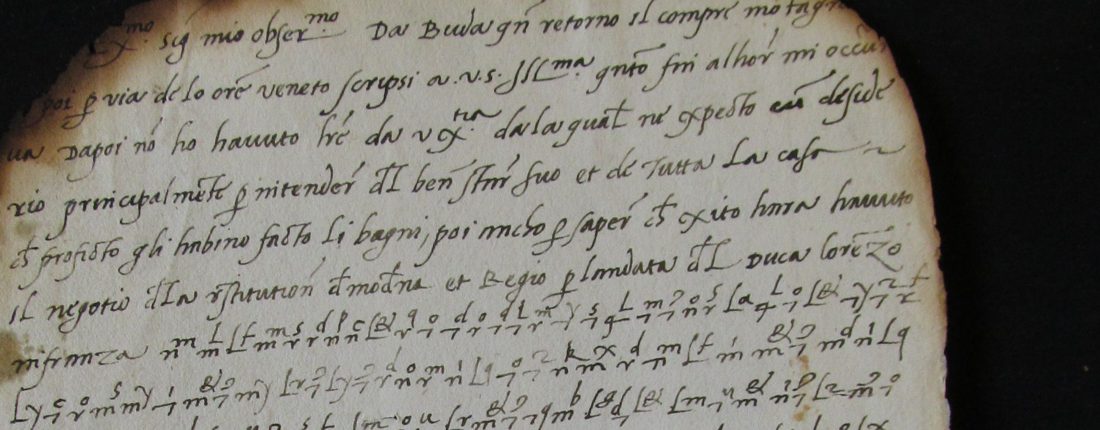 A burned-edged page of Italian cursive whose last lines turn into rows of small signs, strokes with letters written above them