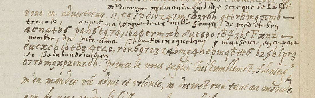 Five lines of figures and letters with a smaller interlinear decipherment in another hand