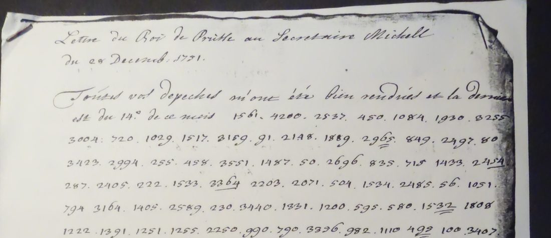 The head of the copy: the heading Lettre du Roi de Prusse au Secretaire Michell du 28 Decemb. 1751, the clear opening, and the first six lines of code groups separated by points