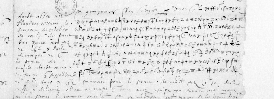 The eight cipher lines on f. 33r with the contemporary decipherment in the left margin and on three lines below
