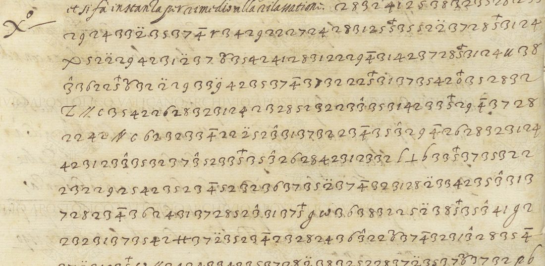 The end of the clear text on f. 17r, then the first lines of the enciphered passage: long runs of two-digit numbers, some with a small sign above (a diaeresis, a circumflex, a cross, a bar), and a few letters and symbols standing for whole words