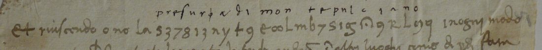 A line of Italian cursive with a run of digits and signs, and above the signs small letters reading presura di montepulciano
