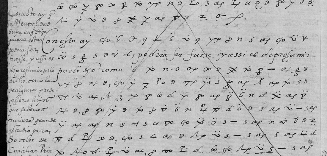 A page of cipher symbols struck through with a large diagonal cross, with a narrow column of Spanish handwriting in the left margin and clear words inside the cipher lines